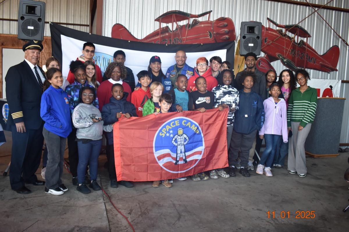 Diallo Wallace with Shades of Blue event attendees